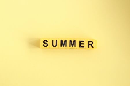 Summer creative concept. The inscription on a yellow backgroundの写真素材