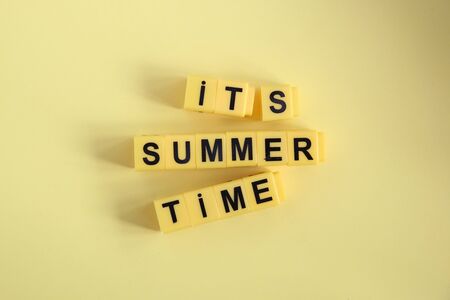 it is summer time, an inscription from yellow cubes, creative concept の写真素材