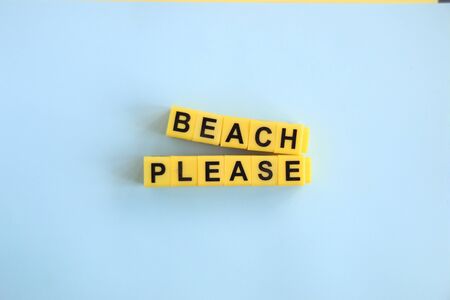 beach please concept, lettering in yellow letters on blueの写真素材