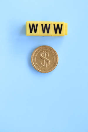 online business, inscription of yellow cubes on a blue backgroundの写真素材