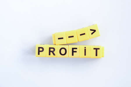 Profit growth concept. The inscription in yellow letters on a blue background.の写真素材