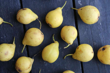 Fresh tasty juicy pears on a vintage table.の写真素材