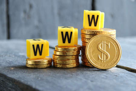 online business creative concept, gold coins and lettersの写真素材