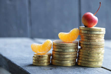 Trade diagram with golden coins moneyの写真素材