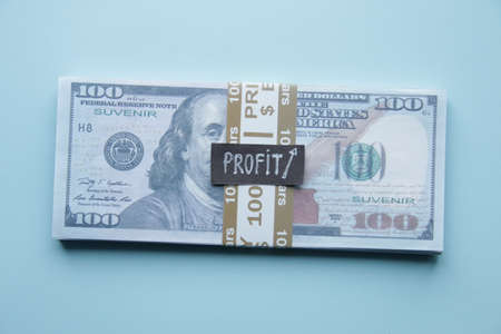 Profit growth business concept. Money on the table and tag.の写真素材