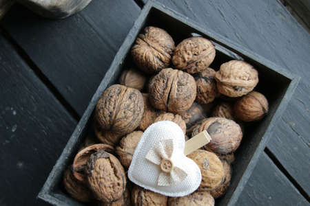 Love creative background. Heart and walnuts, retro style.の写真素材