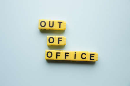 Out of office. Lettering made from yellow cubes.の写真素材
