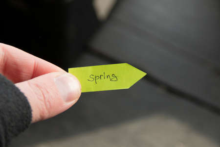 Spring time concept. Text handwritten on green pointer.の写真素材