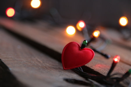 New Year home decorations. Christmas garland and heart.の写真素材