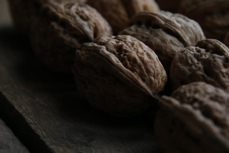 Walnuts on a old vintage kitchen table.の写真素材