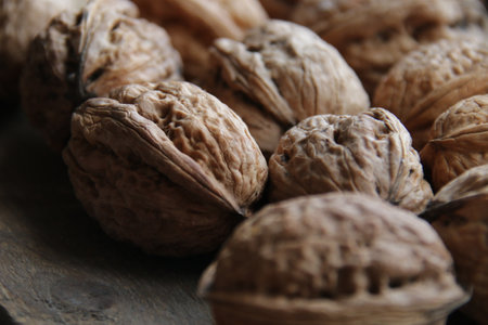 Walnuts on a old vintage kitchen table.の写真素材
