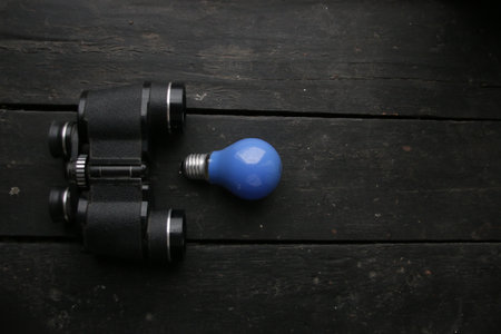 ideas. Blue Lamp and vintage binoculars.の写真素材