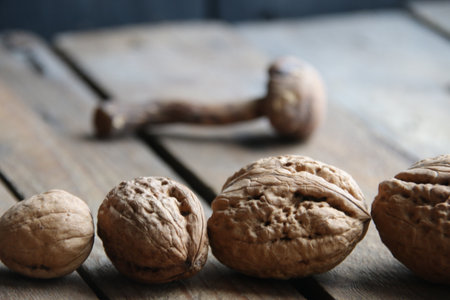Healthy food background. Walnuts on a vintage kitchen table.の写真素材