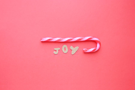 Merry christmas card. The inscription is joy and the staff of Santa.の写真素材