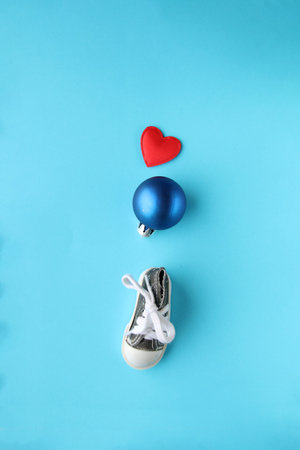 Merry christmas creative card. Christmas bauble and heart.の写真素材