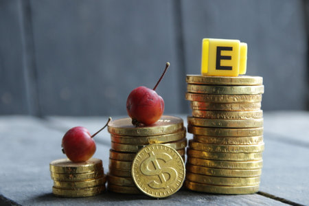 e business. Trade diagram with golden coins.の写真素材