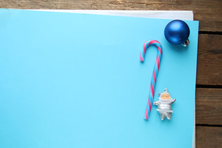 Merry christmas creative card. Santa Claus and candy cane.の写真素材