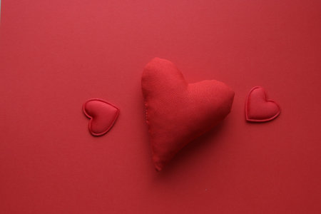 Valentines day background with Hearts or birthday background. Red heart on a red background.の写真素材