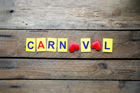 Carnival concept, multi-colored letters lie on the tableの写真素材