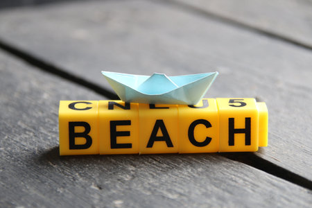 Beach creative concept, inscription on yellow cubes.の写真素材
