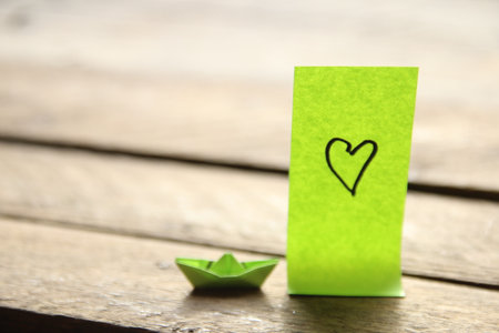 Heart on vintage background. happy birthday. Drawing on a green tag.の写真素材