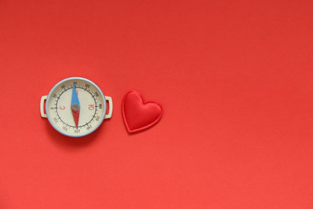 Valentine's Day background. Red heart on a red background.の写真素材