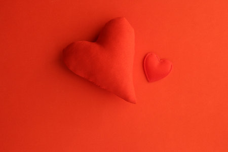 Valentine's Day background. Red heart on a red background.の写真素材
