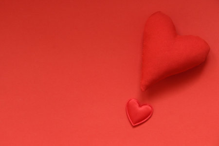 Valentine's Day background. Red heart on a red background.の写真素材
