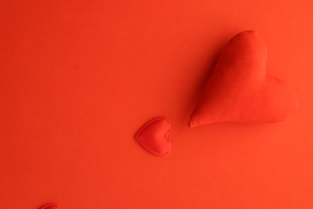 Valentine's Day background. Red heart on a red background.の写真素材