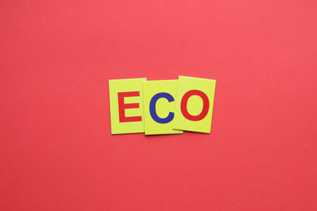 Eco concept. The inscription on the yellow tags on a red background.の写真素材