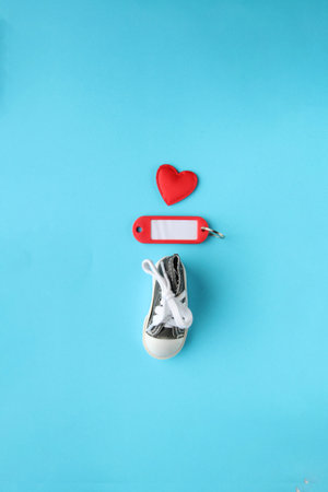 Sport and fitness creative concept. Sneaker on a blue background.の写真素材