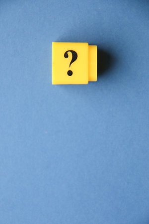Large question mark on a blue background..の写真素材