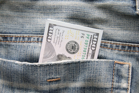 Dollars in a jeans pocket, Closeup. Money in pocket.の写真素材