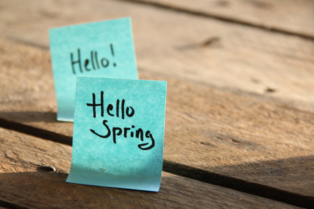 Hello spring concept! The inscription on the blue tag.の写真素材