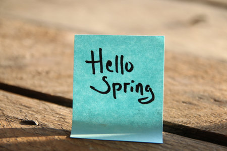 Hello spring concept! The inscription on the blue tag.の写真素材