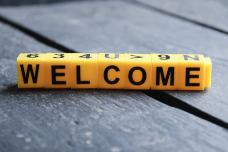 Welcome creative concept, inscription on yellow cubes.の写真素材
