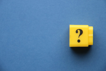 Large question mark on a blue background..の写真素材