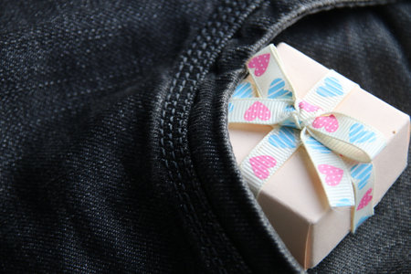 Gift in jeans pocketの写真素材
