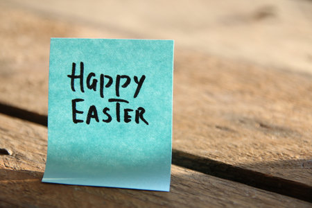 Happy Easter concept! The inscription on the blue tag.の写真素材
