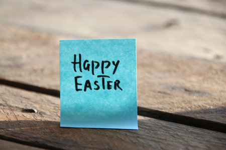 Happy Easter concept! The inscription on the blue tag.の写真素材