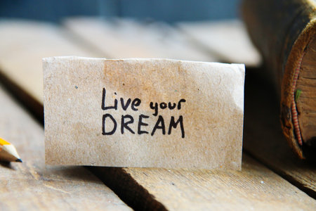 Live your dream card. The inscription on the tag. vintage style. Motivational quotes.の写真素材