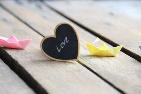 Birthday background. Heart on a wooden background. Place for text. Valentines card.の写真素材
