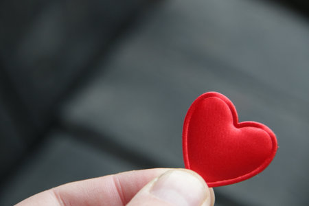 Red heart on a vintage background. Place for text. Valentines card. Birthday background.の写真素材