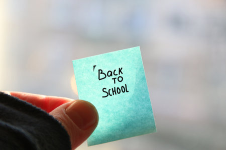 Back to School text on a paper tag.の写真素材