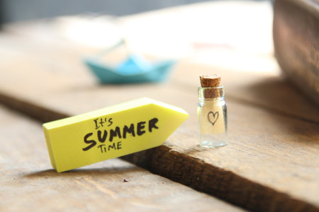 Its Summer time concept origami paper boat and tag.の写真素材