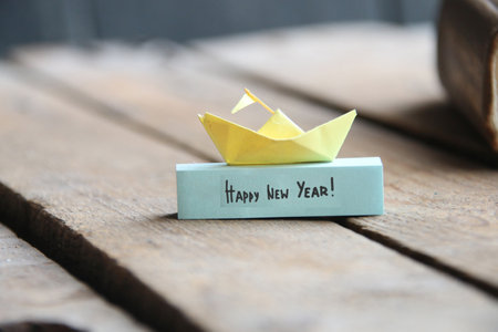 Happy New year. Paper ship and tag.の写真素材