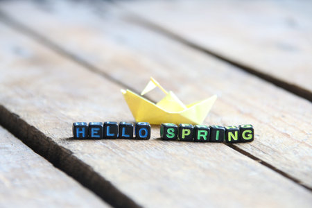 Hello Spring concept. Inscription on the cubes.