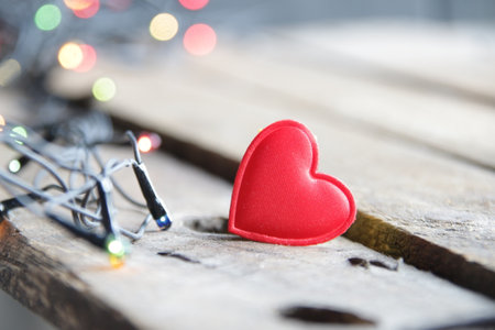 Christmas garland close up and heart. New Year home decorations.の写真素材