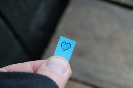 Heart. Drawing on a tag. Happy birthday, Valentines Day background.の写真素材