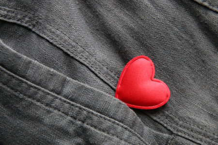 Red heart in jeans pocket. Valentines day concept.の写真素材